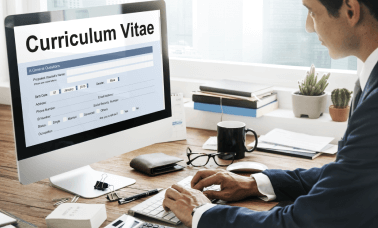 Translator reviewing a resume, highlighting the importance of fast and accurate CV translation services for job seekers.